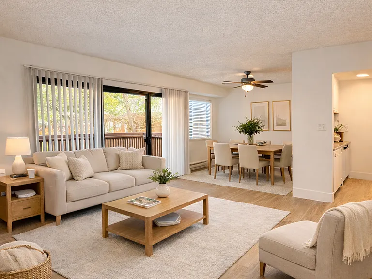 Living Room and Dining Room - Remodeled Unit - AI Staged