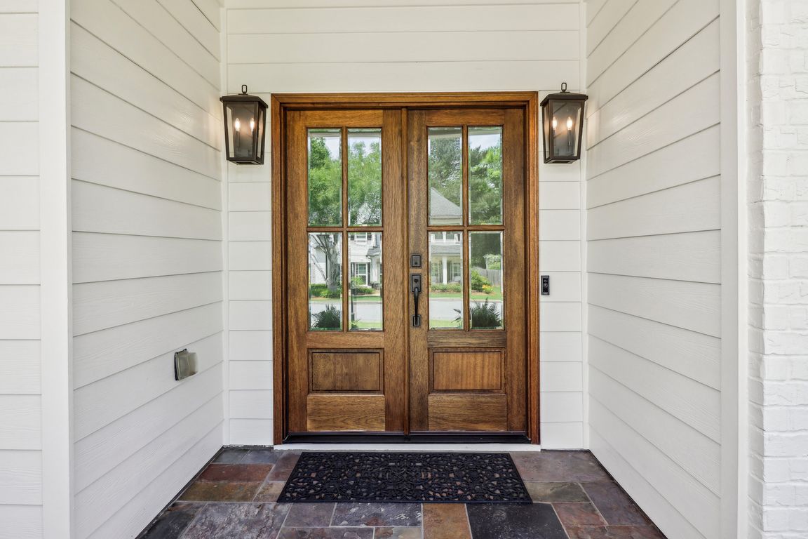 Custom Mahogany French Doors and upgraded light fixtures