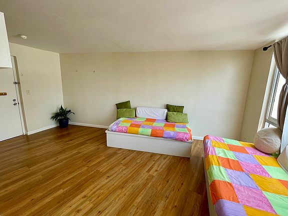 Living Room - view from dining room (Bed NOT included in the rental, but for size reference, these are twin sized daybeds)