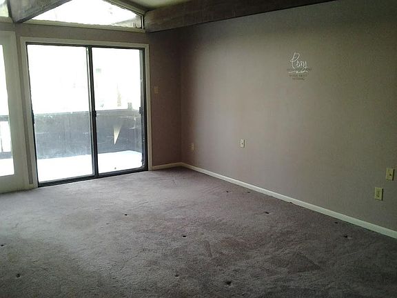Master bedroom with private deck and cathedral ceilings