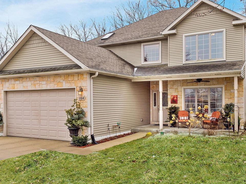 Nice Curb Appeal and Elevation with Architectural Design Layers. Stone Front, Paneled Garage Door, Distinctive Lighting, Wider D