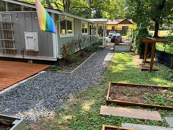 Gravel walking path to backyard.
