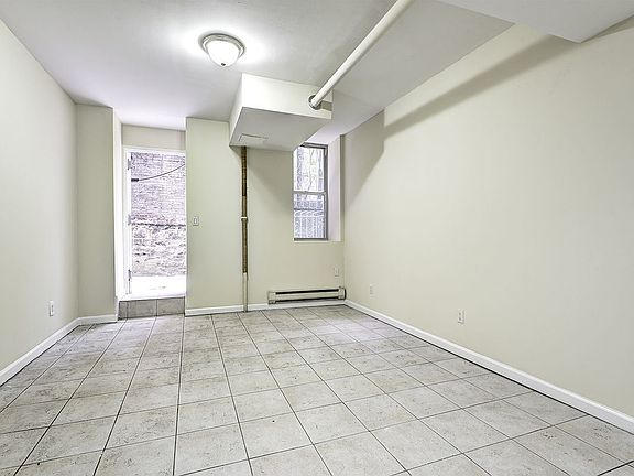 3rd image of 283 Audubon Ave Bsmt B1