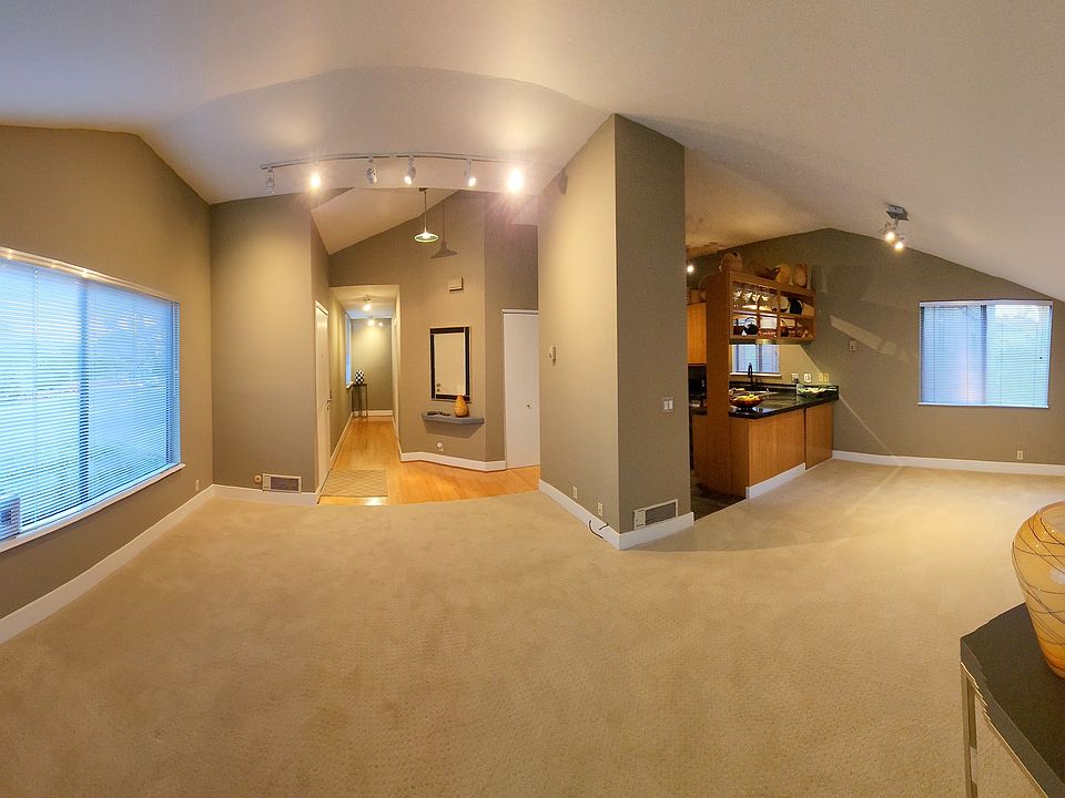 Open Plan; living room entry, and dining area