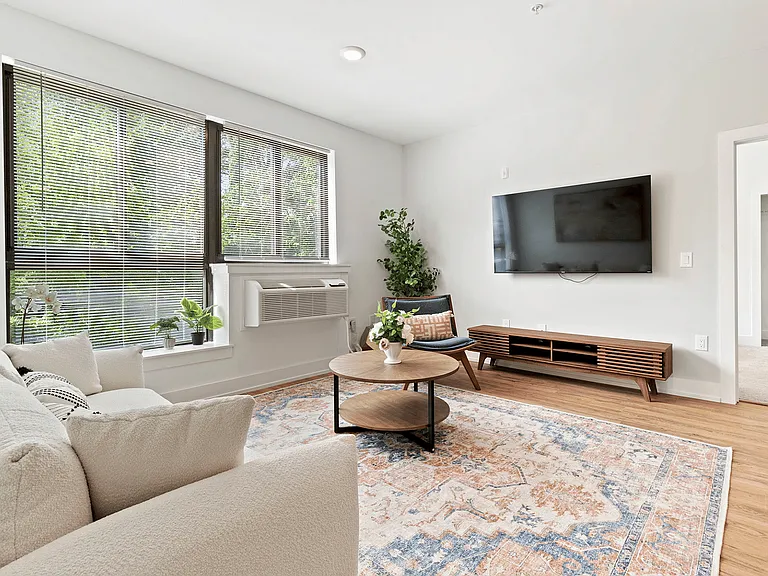 Experience the perfect blend of comfort and style in this bright, modern living room.