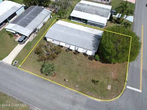 601 Draco Dr, Barefoot Bay, FL 32976