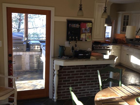 Kitchen looking out toward outdoor kitchen