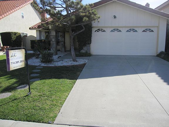 Two car garage with roll-up door