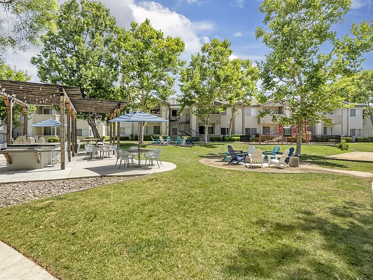 The Summit's communal area offers a fire pit, playground, and two gas grillsperfect for relaxing, playing, and grilling with friends and family.