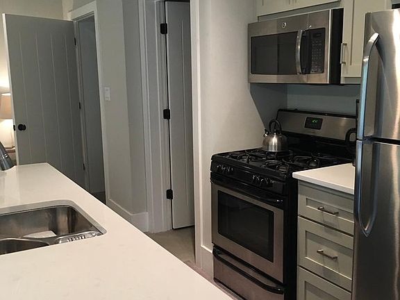 Kitchen with all major full size appliances.