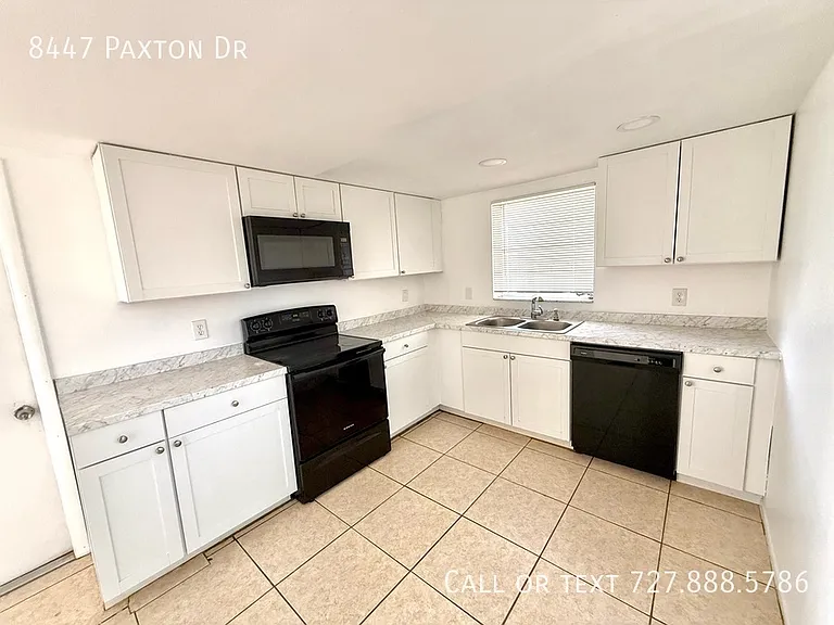 8447 Paxton Dr — Photo 14