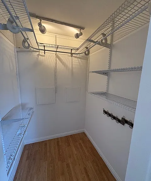 WALK IN CLOSET IN MASTER BEDROOM