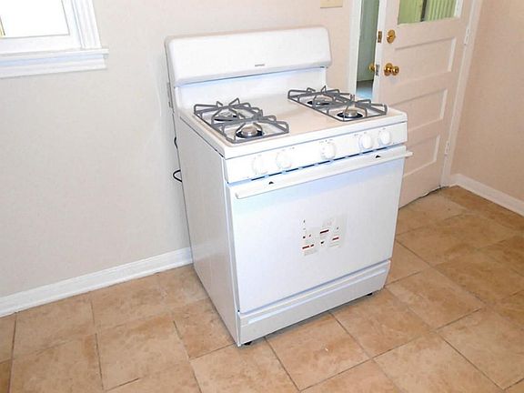 Kitchen With New Gas Stove.