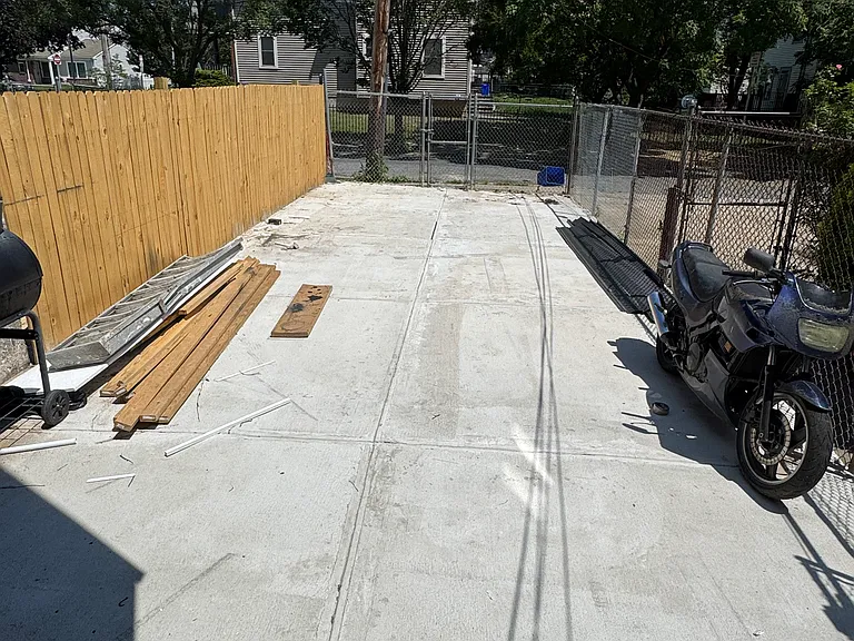 backyard with view from the house to the street
