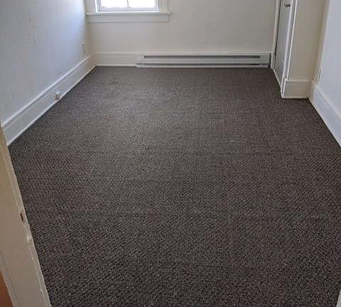 Bedroom new baseboard, walls painted