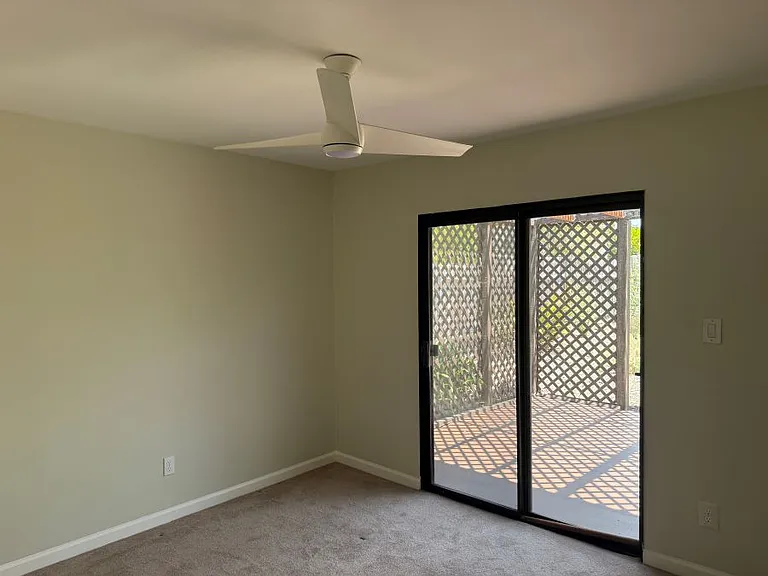 Rear bedroom facing patio and garden