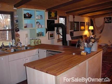 Kitchen
						:
						Dishwasher hookup, Electric Stove, New base cabinets and Open Upper.