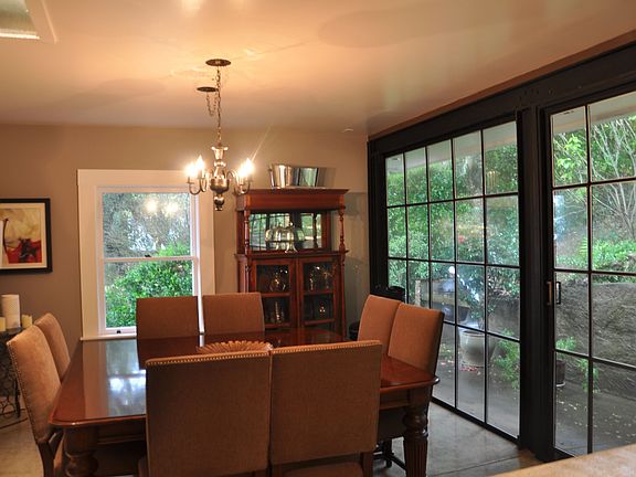 DR & kitchen have heated polished concrete floors and gdn view!