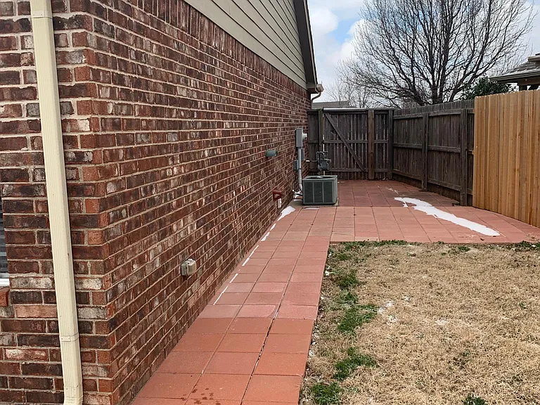Side of house..paved