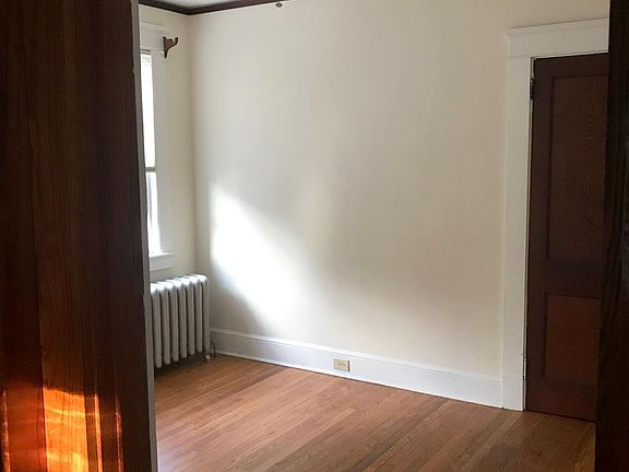 Entering front bedroom.