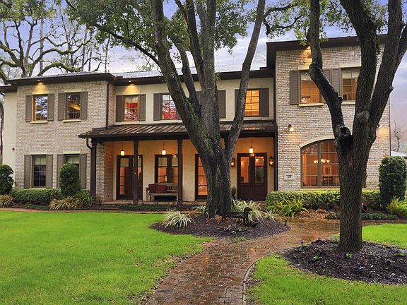 Welcome to 331 Chapel Belle with its large grassy lawn, mature trees, shrubs plus some fruit trees. The wrought-iron driveway gate encloses a large parking court with access to the 3 car garage.