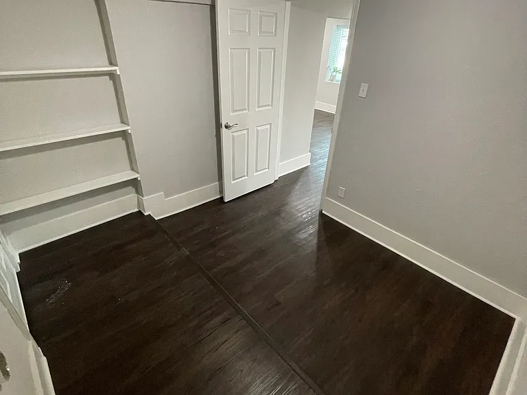 Spacious laundry room with built in storage!
