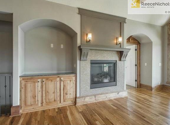 Fireplace with Tile Surround and Built Ins