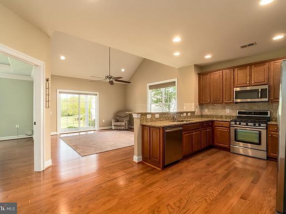 Gourmet kitchen opens to family room