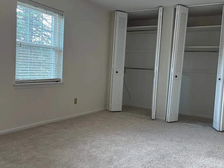 Master bedroom with plenty of closets