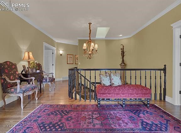 Stunning Entryway with curved stairway to downstairs