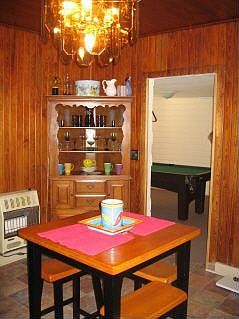 kitchen with varnished pine walls