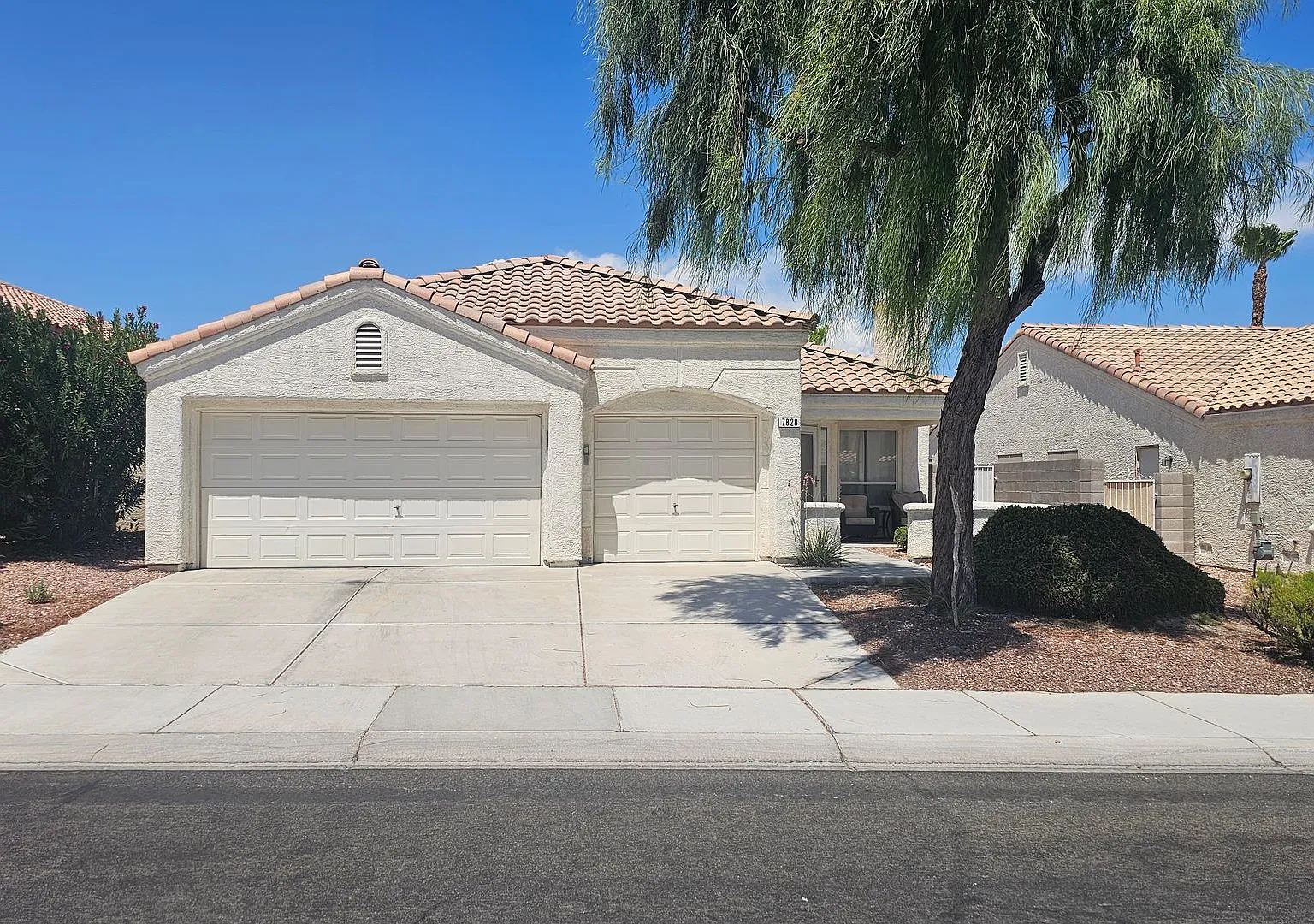 Spacious 3-Bedroom Home with 3-Car Garage & Beautiful Landscaping — Photo 1