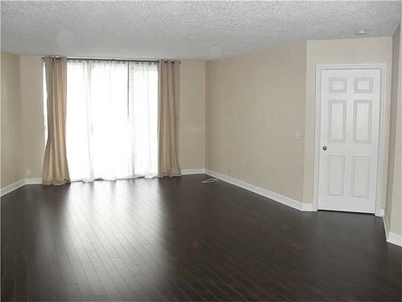 4th image of 3500 Mystic Pointe Dr APT 707