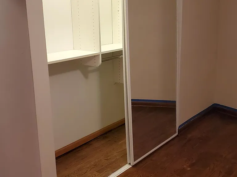 Bedroom closet w/ custom shelving system. over 6feet of closet space.