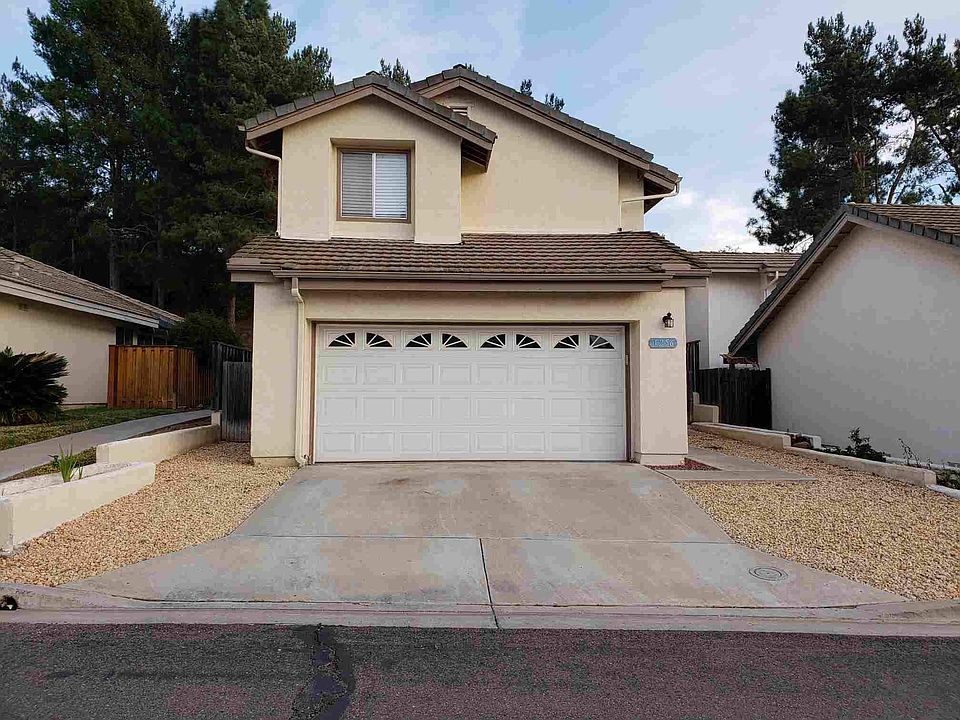 2 story detached home with low maintenance landscaping