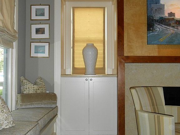 Your art work looks great in these custom display cabinets
