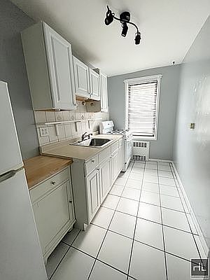 3rd image of 87-10 34th Ave #E