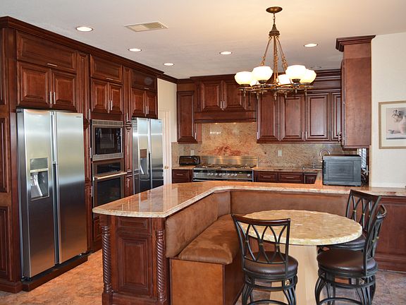 Double Fridge with 3 Ovens