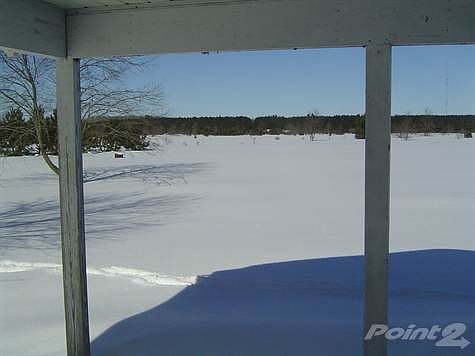 view from covered back deck