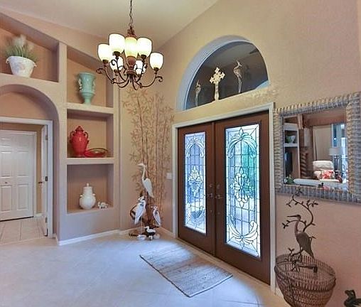 Inside house looking towards front doors.