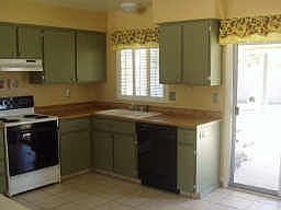 Eat-in Kitchen with lots of cabinets.