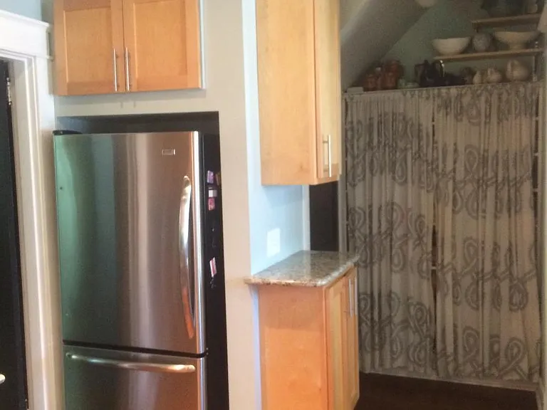 Breakfast nook is to the right, sink behind.