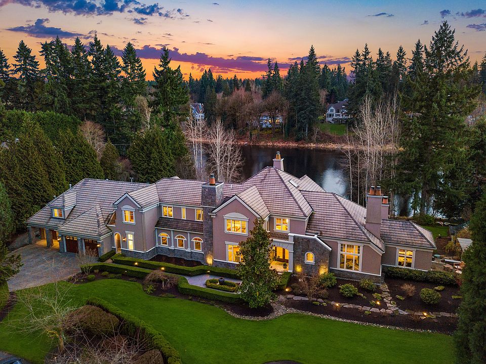 Indulge in luxury at Lake Of The Woods Chateau: an exquisitely crafted residence where hand-selected finishes present unparalleled living.