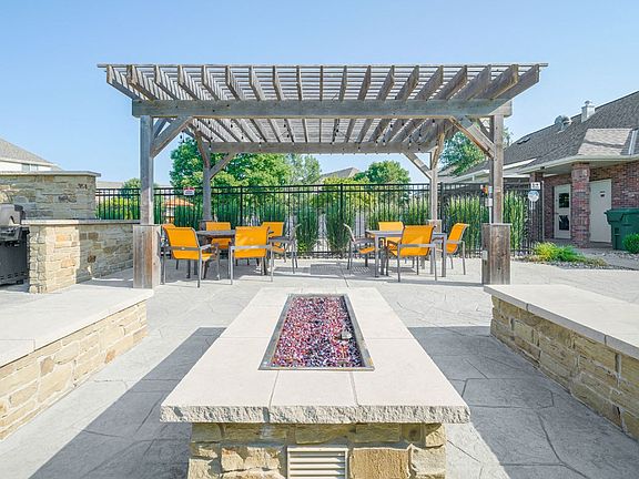 Elevate your outdoor experience with our poolside grill areaperfect for a summer BBQ or cozy evening by the firepit.
