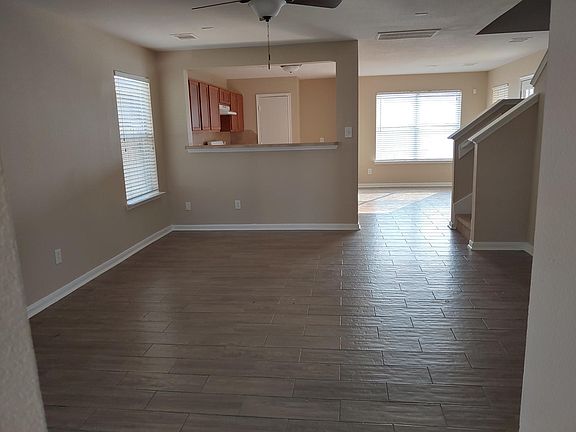 From the front door, study to the left, half bath to the right and closet.