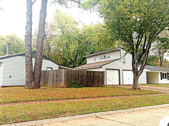 Side view showing the garage and loft behind the house to the left
the house to the right in the photo is not part of the property
This is a Great location in a Great Neighborhood