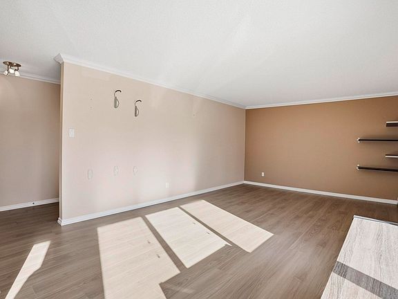 4th image of 10555 83rd Ave NW #202