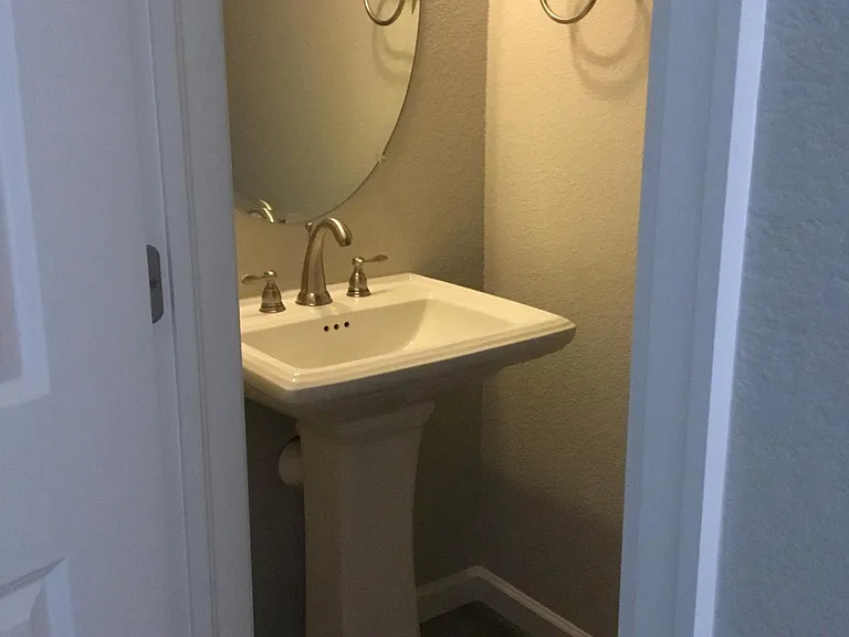 Powder Bathroom close to laundry, mudroom and garage