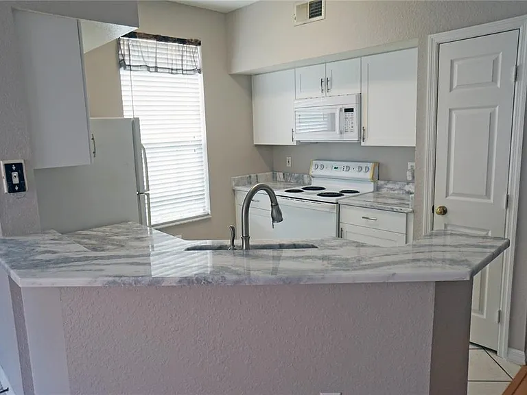 9018 Lake Chase Island Way #9018 — Photo 5