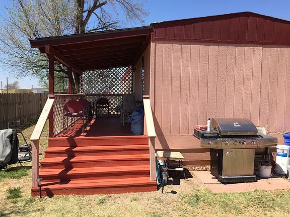 Rear entrance & Covered Deck